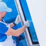 Worker installing a new window