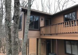 vinyl siding sunroom and deck