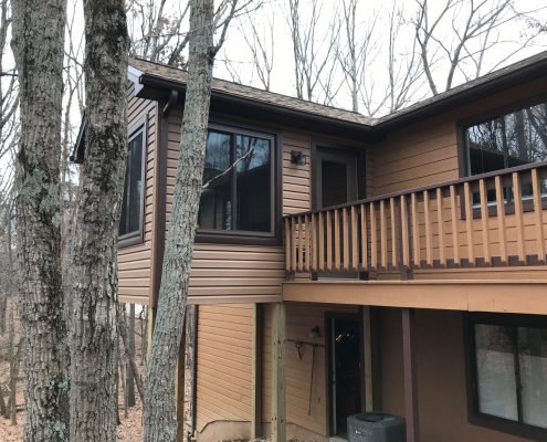 vinyl siding sunroom and deck