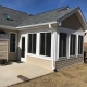 Custom sunroom with vinyl siding