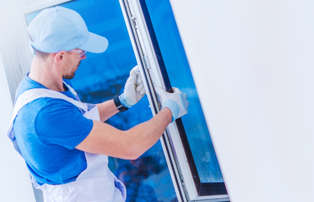 Worker installing a new window