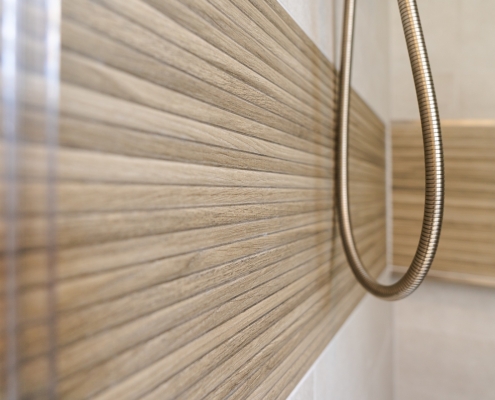 Shower tile details in primary bathroom remodel.