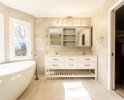 Double vanity and air tub in a bathroom remodel.