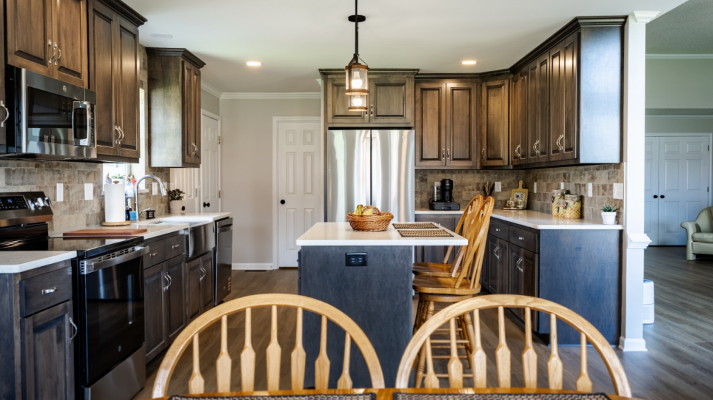 2 Rockingham kitchen after a kitchen remodel with dark cabinets and stainless steel appliances.