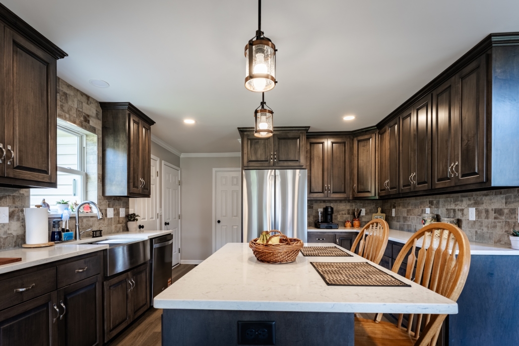 Rockingham kitchen after a kitchen remodel with dark cabinets and stainless steel appliances.