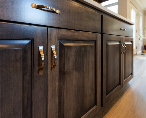 HHI_NutmegCt_Kitchen-31 Rockingham kitchen with dark cabinets and stainless steel appliances.